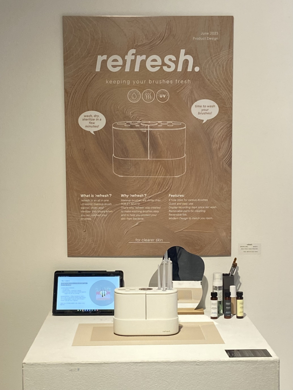 an exhibition of my product with a vanity set up and a poster explaining the product