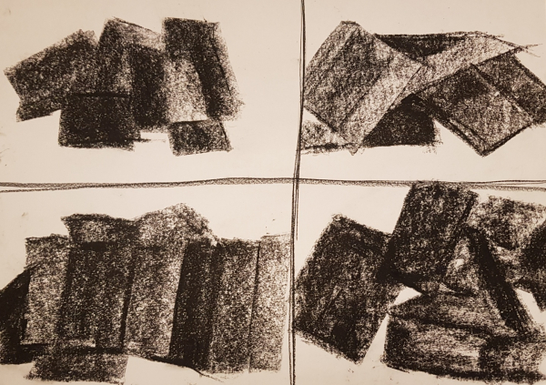 cardboard boxes expressed with thick strokes of charcoal