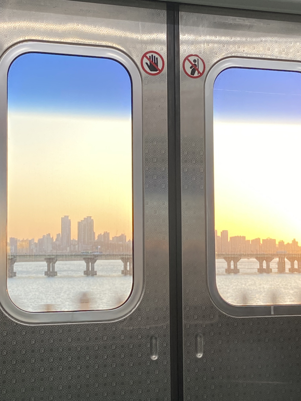 a sunset view of the Han River on the subway