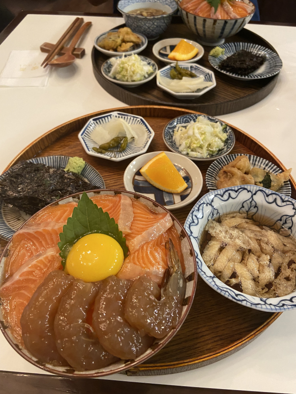 a raw salmon and shrimp bowl