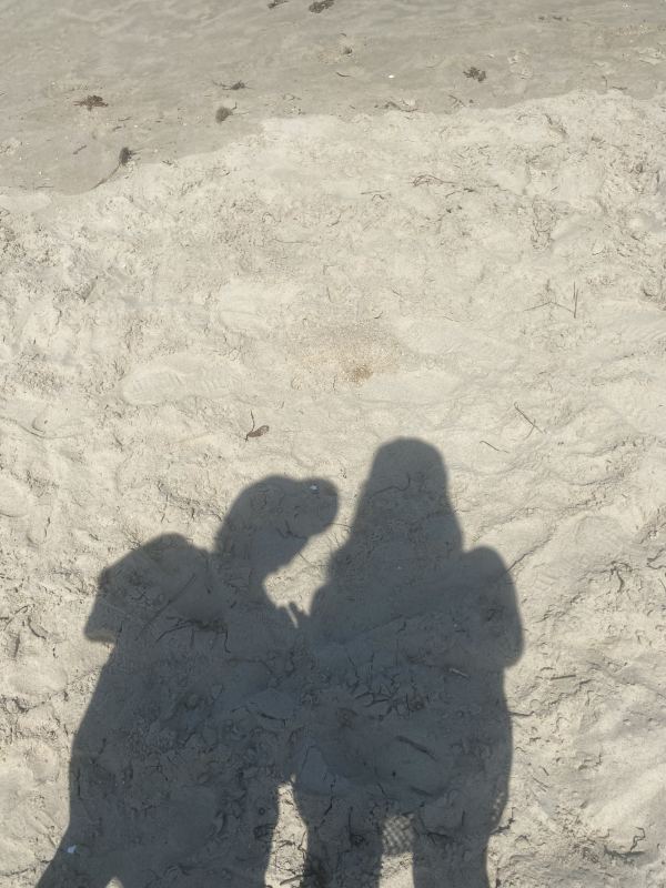 shadows of me & my boyfriend at the beach
